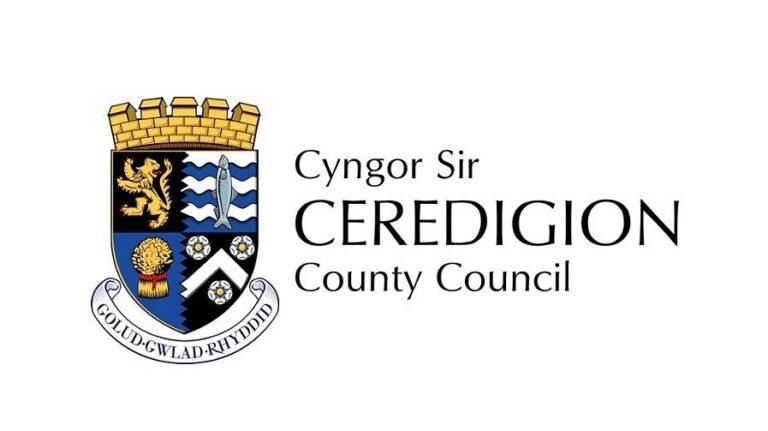 Logo for Ceredigion County Council featuring a crest in blue white and gold colurs.